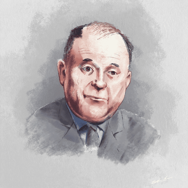 Portrait of a businessman on a grey background